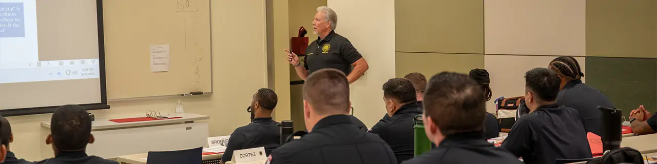 Cadets in the classroom with Director Cannon as the instructor