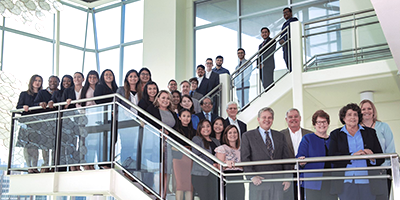 Ted Bauer recipients standing on stairwell