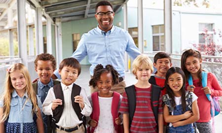 Teacher with students