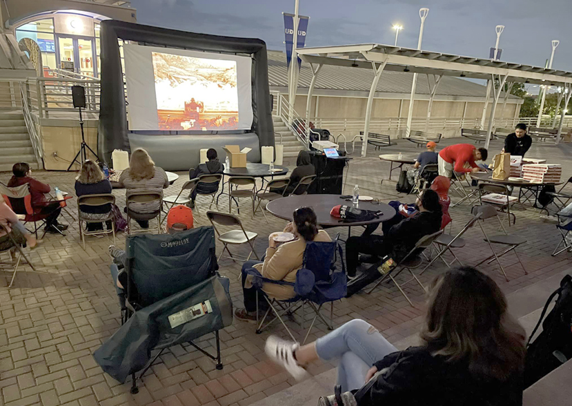 Group of movie watchers on the North Deck of the UHD main building