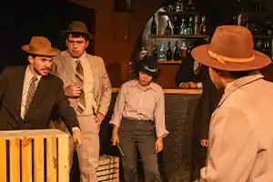 actors look a empty open crates 