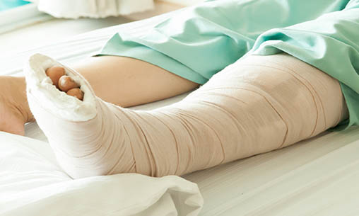 Physical and Mental Loss - patient in a cast in bed