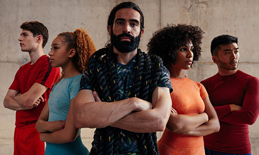 Self-Defense Instructor in group shot with their class