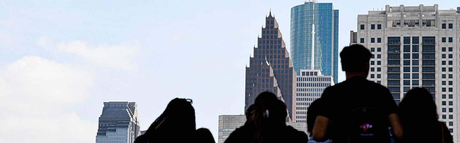 students at the cst building viewing the downtown cityscape