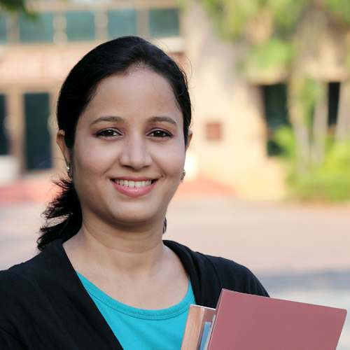 female student smiling at the camera female student smiling at the camera