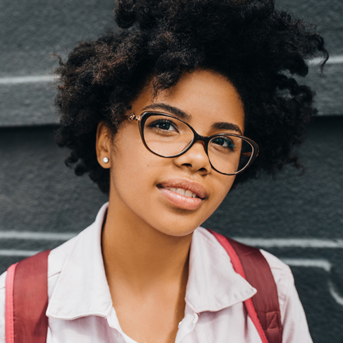international student smiling at the camera