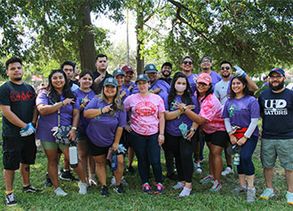 Students planting flowers