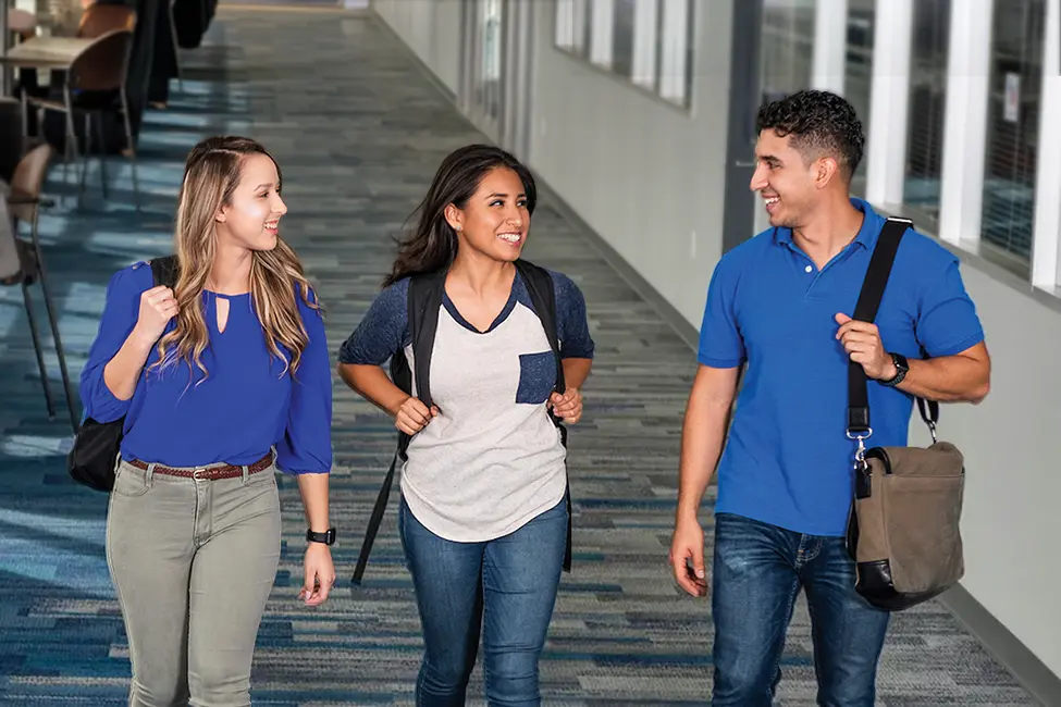 Students walking through a hallway