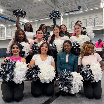 University of Houston-Downtown cheerleaders at Gator Con at the wellness and success center