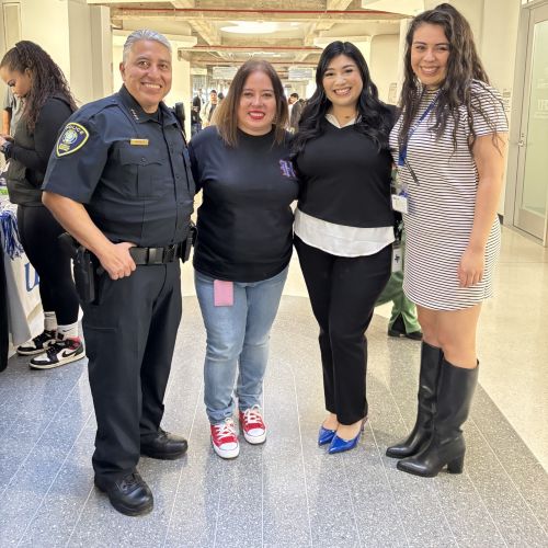 Chief Rodriguez, family, and UHD staff