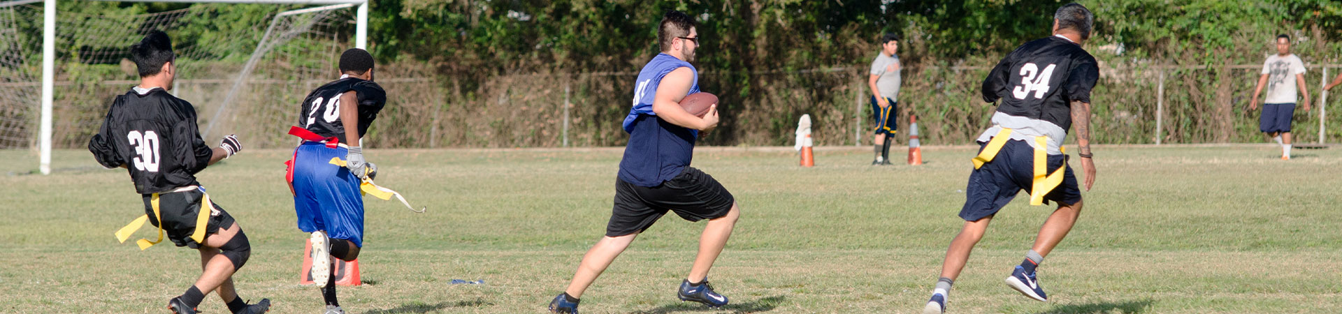 UHD students playing sports.