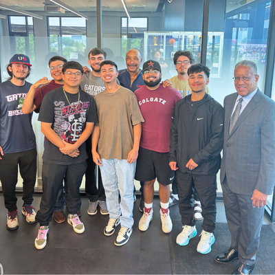 university of houston-downtown's baseball club team smiles with Head Coach Scipio Spinks and UHD President Dr. Loren J. Blanchard at the university's Wellness and Success Center 