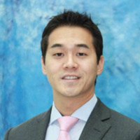 Robert Gondo, Tokyo Gardens Company President, smiles 