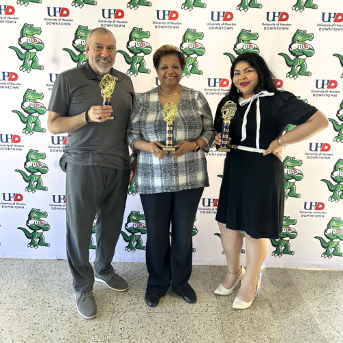 Three winners of the get fit texas challenge hold trophies at the university of houston-downtown
