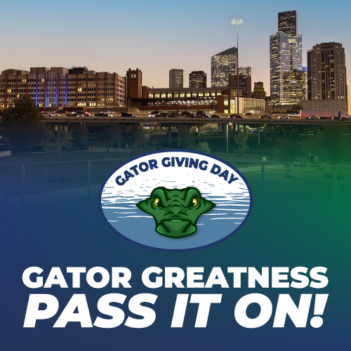 A gator with its snout above water. Text reads 